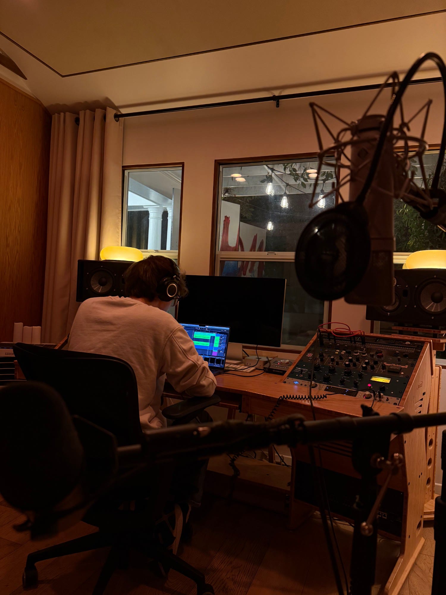 tracking in a warm-lit studio